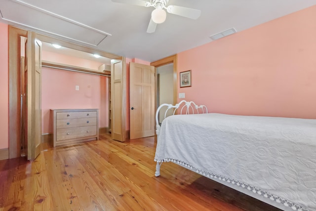 6264 Main St, Trumbull, CT 06611 - bedroom with attic access, light wood-style flooring, and a ceiling fan