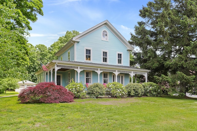 6264 Main St, Trumbull, CT 06611 - view of front of property with a front lawn and covered porch