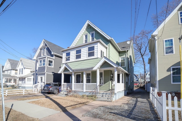 view of front of property featuring covered porch