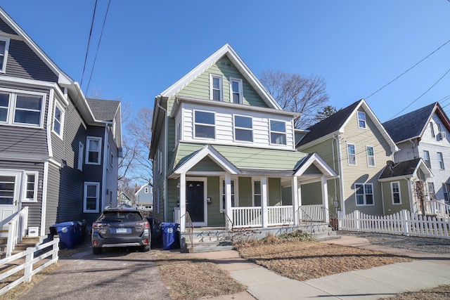 view of property with covered porch