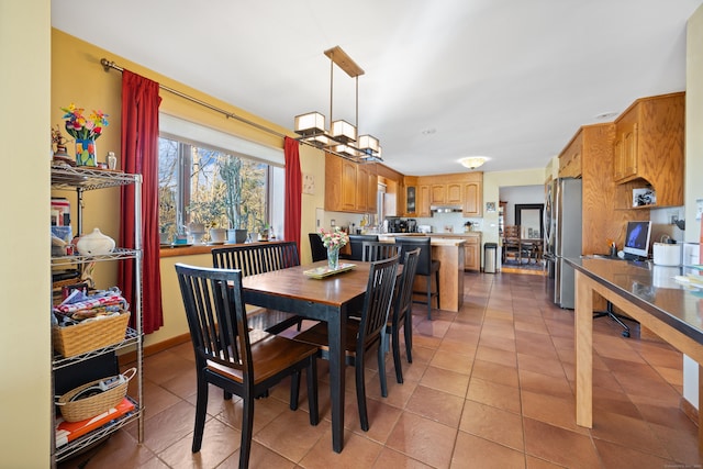 dining room with light tile patterned floors