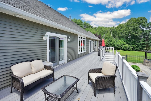 wooden deck featuring an outdoor hangout area