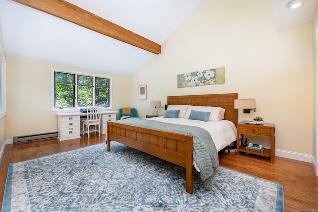 bedroom featuring hardwood / wood-style flooring, lofted ceiling with beams, and a baseboard radiator