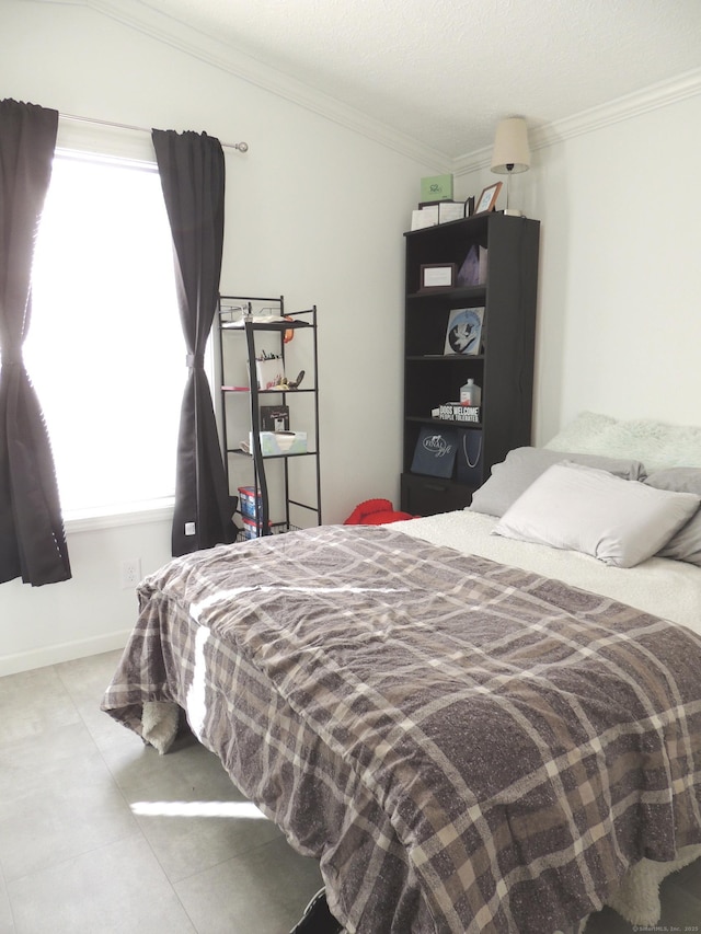 bedroom with crown molding