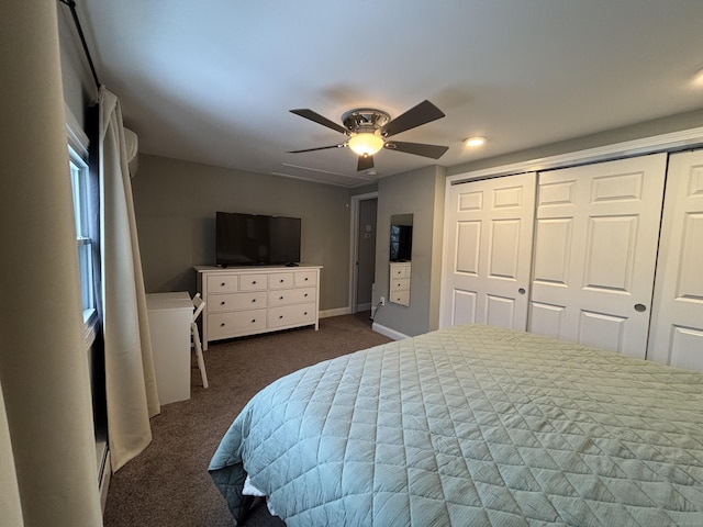 bedroom featuring ceiling fan, a closet, and dark colored carpet