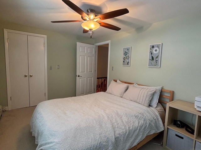 bedroom with carpet floors, a closet, and ceiling fan