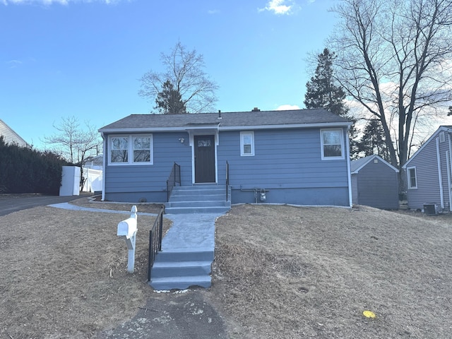 view of front of property with central AC unit