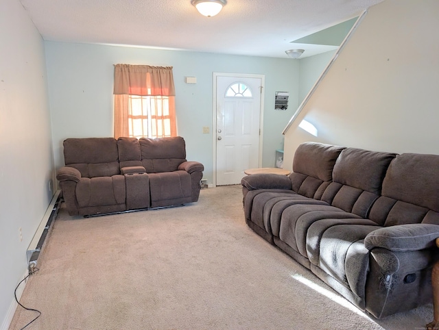 living room featuring a baseboard radiator and light colored carpet