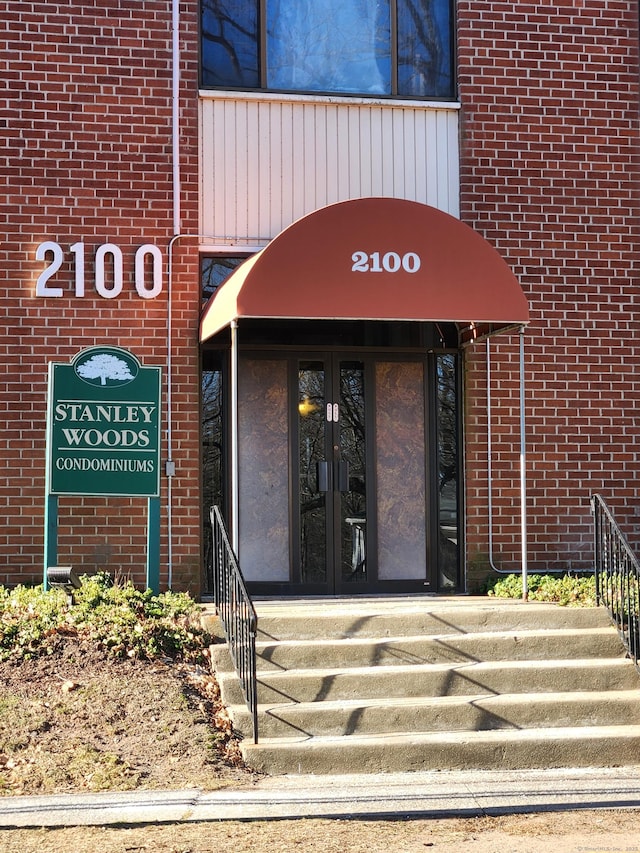 property entrance featuring french doors