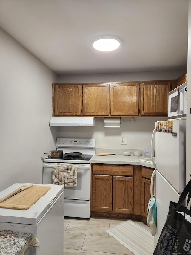 kitchen featuring white appliances