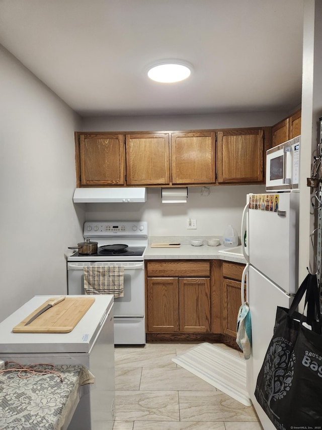 kitchen with white appliances