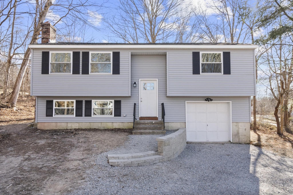 raised ranch with a garage