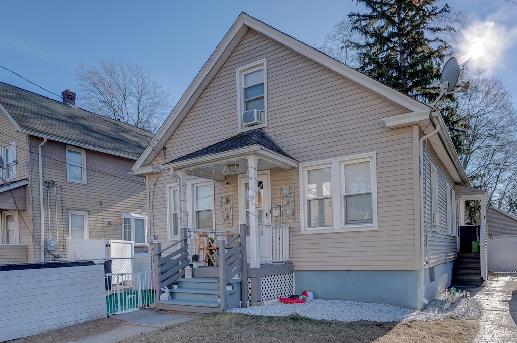 view of front of home with cooling unit