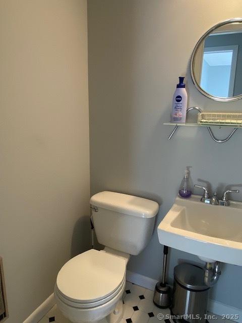 bathroom with toilet and sink