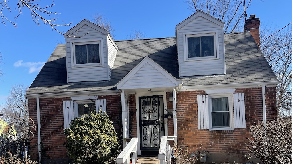 view of new england style home