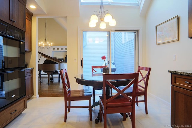 dining room featuring a notable chandelier