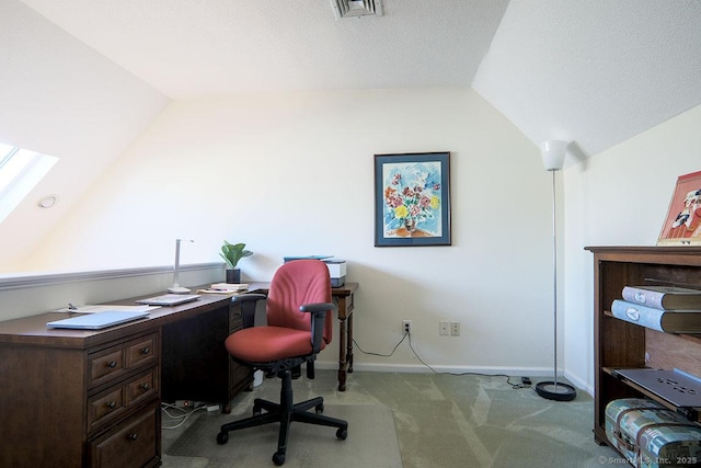 office with light colored carpet, lofted ceiling with skylight, and a textured ceiling