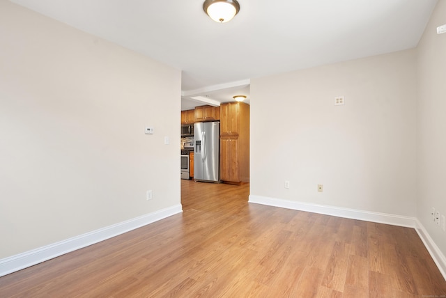 empty room featuring light hardwood / wood-style floors