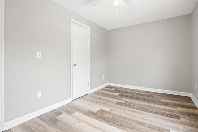 spare room with ceiling fan and light hardwood / wood-style flooring