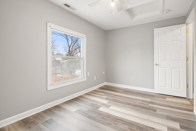 unfurnished room with ceiling fan and light wood-type flooring