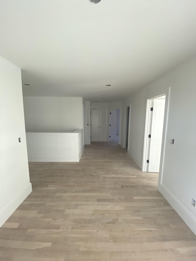 hallway featuring light wood-type flooring