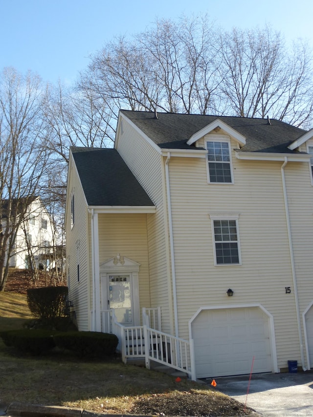 view of property exterior featuring a garage