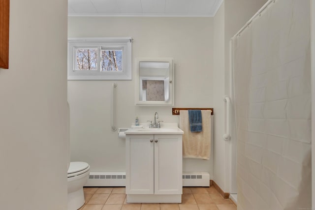 bathroom with vanity, tile patterned floors, baseboard heating, and ornamental molding