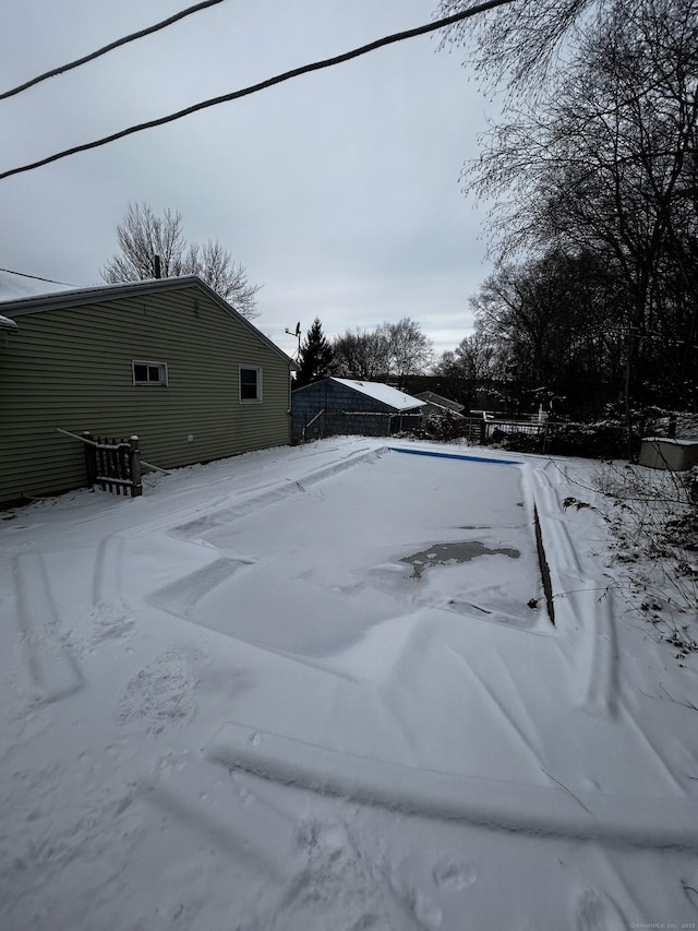 view of yard layered in snow