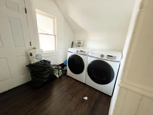 laundry area with dark hardwood / wood-style flooring and washer and clothes dryer