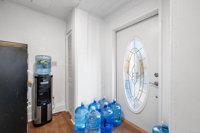 foyer entrance with dark hardwood / wood-style floors