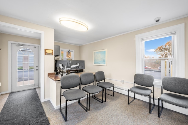 office area with crown molding and baseboard heating