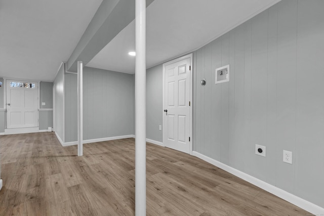 basement featuring light hardwood / wood-style floors