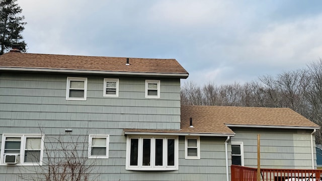 view of side of home with cooling unit