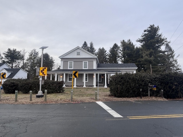 view of front of home featuring covered porch