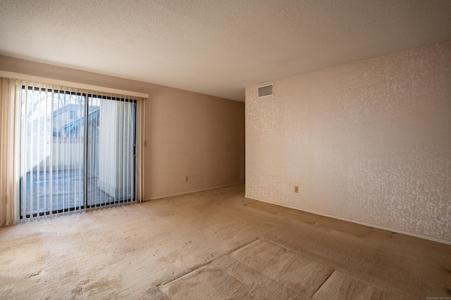 empty room with carpet flooring