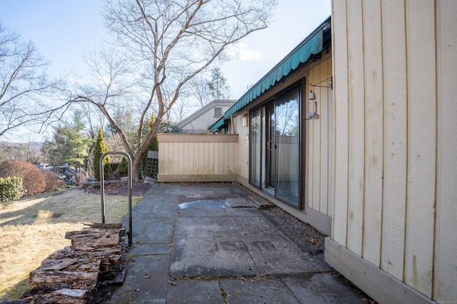 view of property exterior featuring a patio