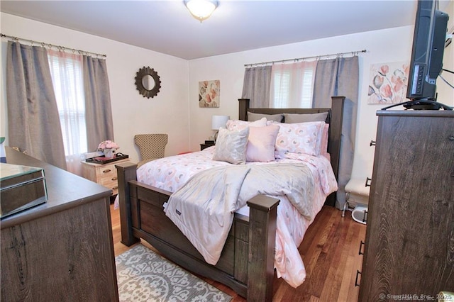 bedroom featuring light hardwood / wood-style floors