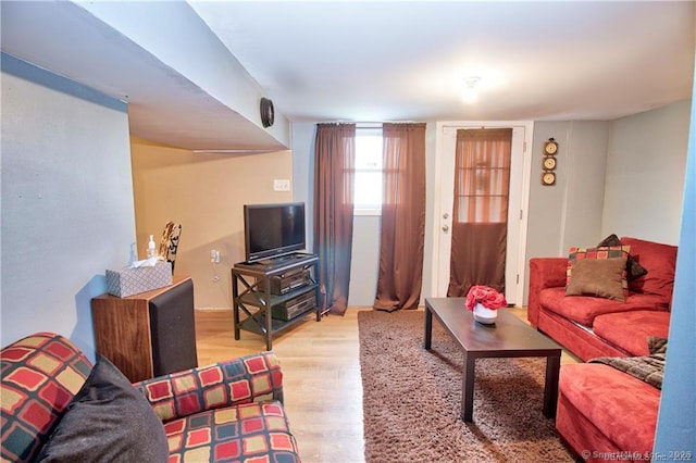 living room with light hardwood / wood-style flooring