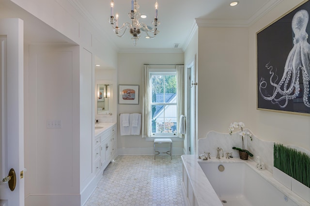 bathroom featuring ornamental molding, a bathtub, vanity, and a notable chandelier