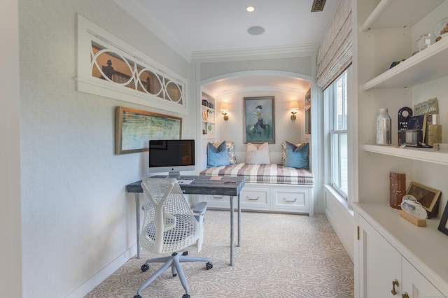 office space featuring light colored carpet and crown molding