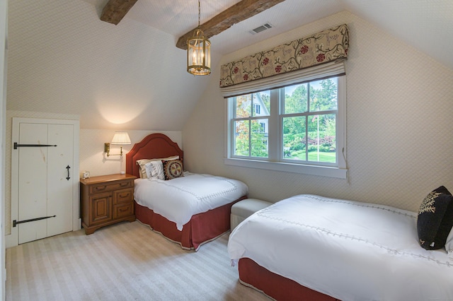 bedroom with light colored carpet and vaulted ceiling