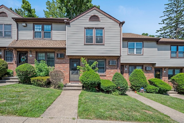 view of front of home with a front lawn