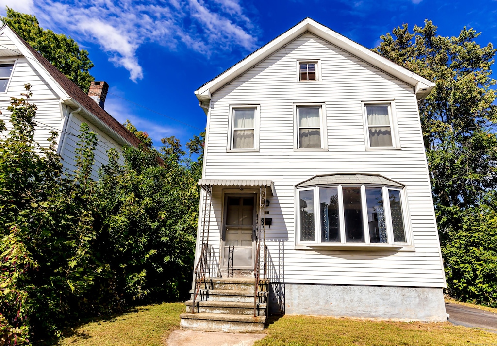 view of property with a front yard