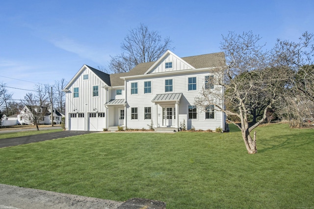 view of front of house featuring driveway, roof with shingles, an attached garage, a standing seam roof, and board and batten siding