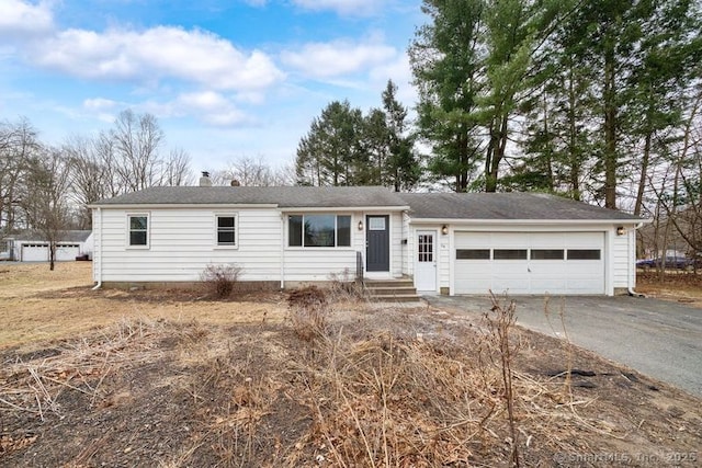 single story home featuring a garage