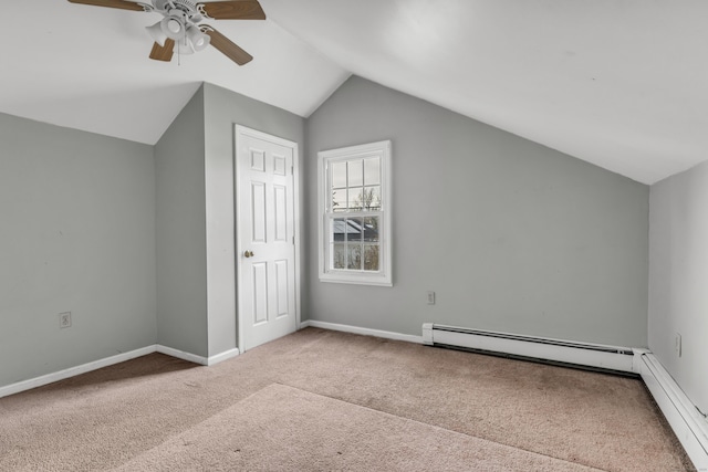 bonus room featuring vaulted ceiling, ceiling fan, a baseboard heating unit, and carpet flooring