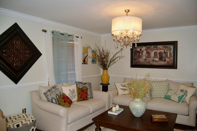 living room featuring ornamental molding and a notable chandelier