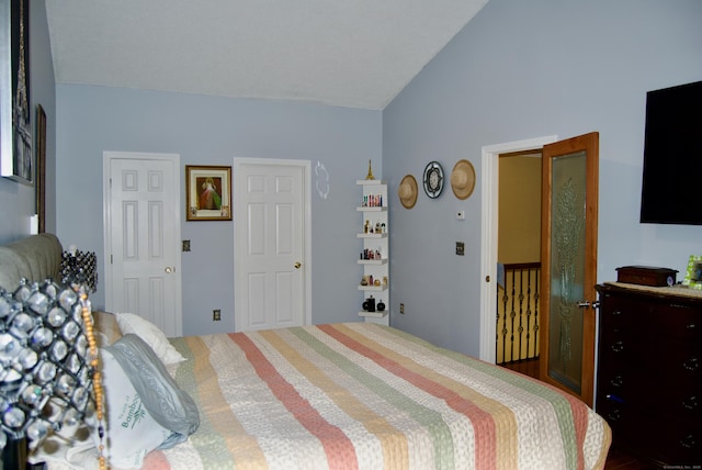 bedroom with vaulted ceiling