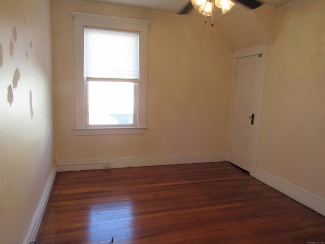 unfurnished room with ceiling fan and dark hardwood / wood-style floors