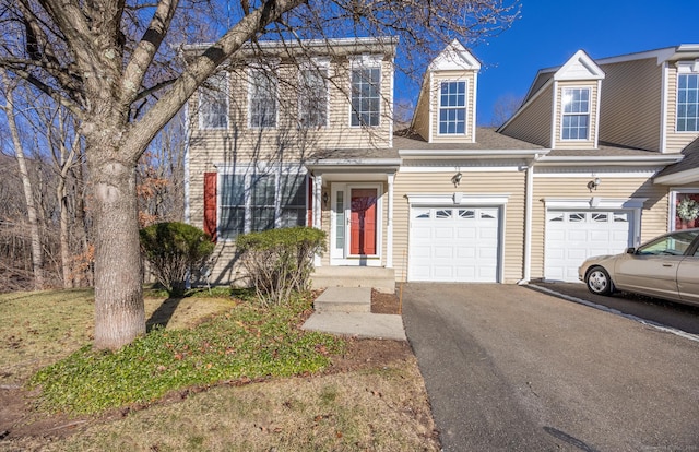 view of front of home with a garage